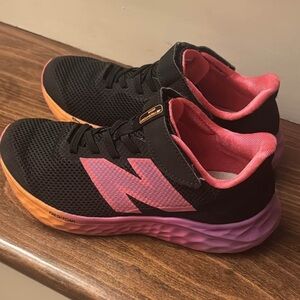 New Balance Fresh Foam Arishi kids sneakers black pink orange size 2